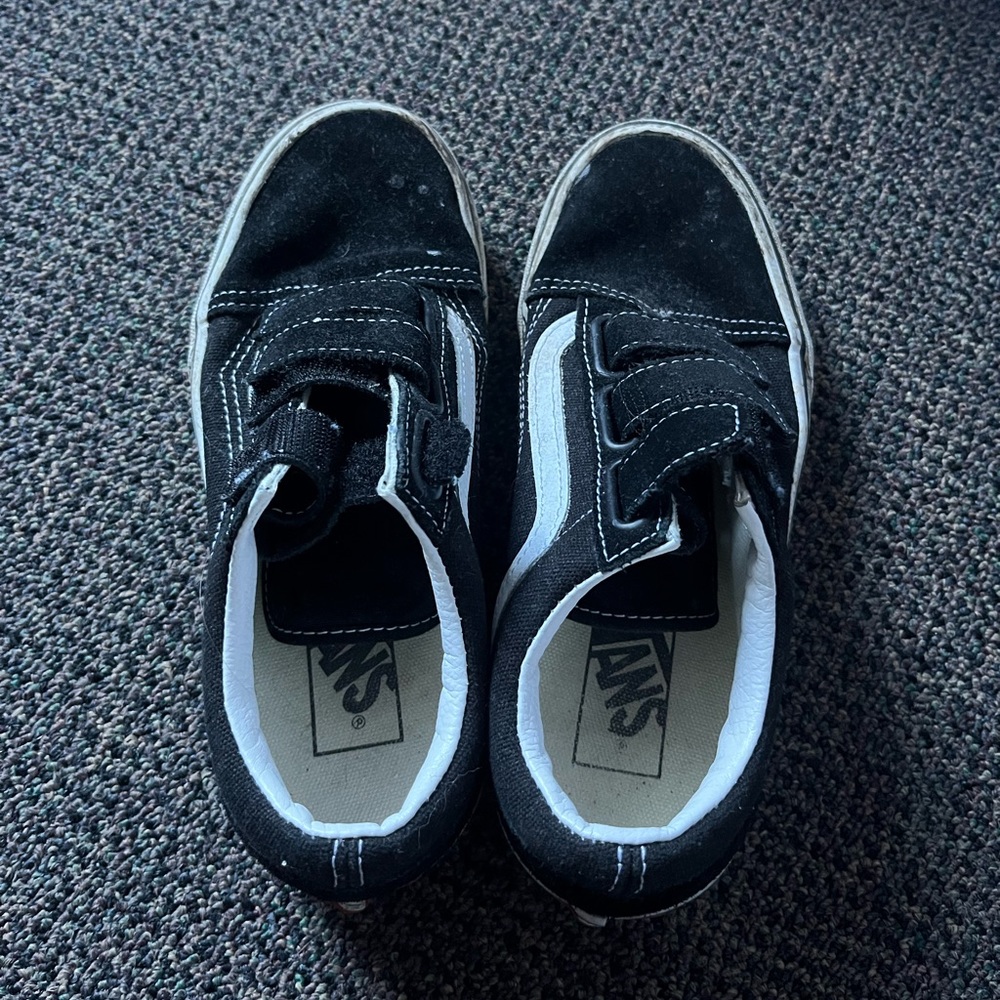 Women’s black Velcro vans